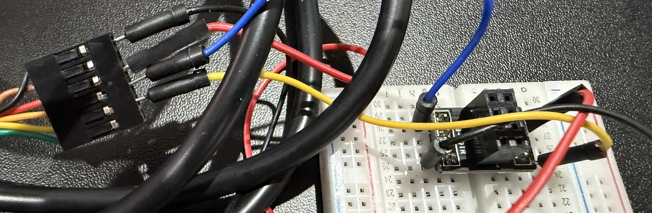 A mess of adapter, breadboard, wires and FTDI cable